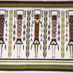 Traditional textile with symmetrical geometric patterns in earthy colors.